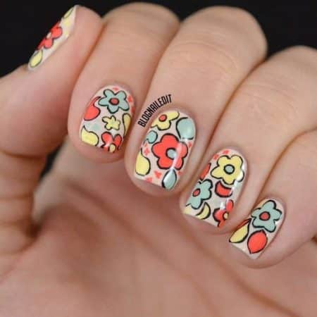 diseños de uñas con flores rojas