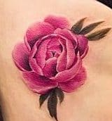 tatuaje flor rosa costillas opt e1507557026726